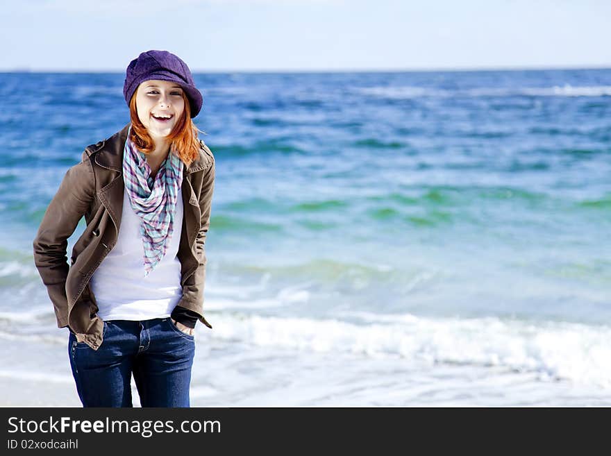 Fashion young women at the beach in sunny day. Outdoor photo.