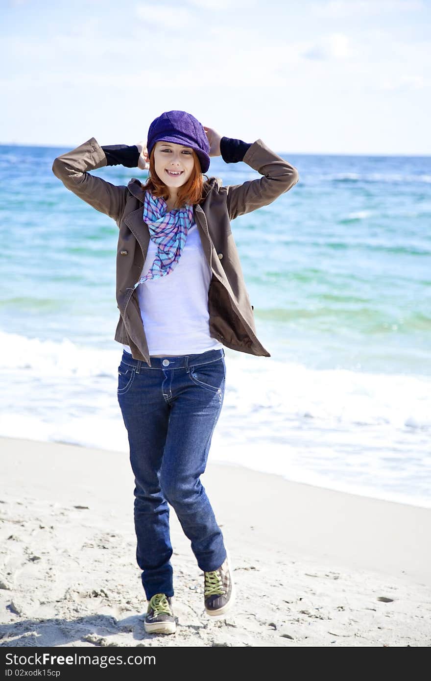 Fashion young women at the beach in sunny day. Outdoor photo.