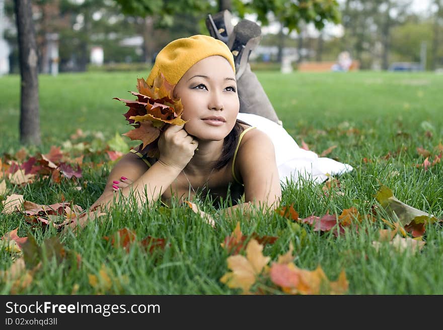 Girl resting in autumn park. Girl resting in autumn park