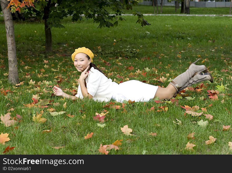 Girl resting in autumn park. Girl resting in autumn park