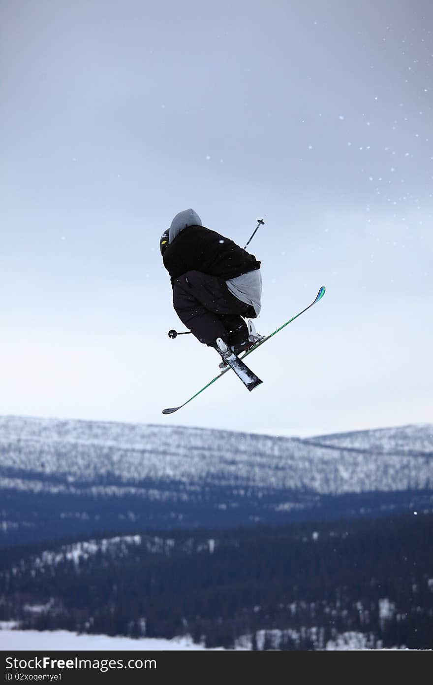 Teenage skier who jump high up in the air. Teenage skier who jump high up in the air