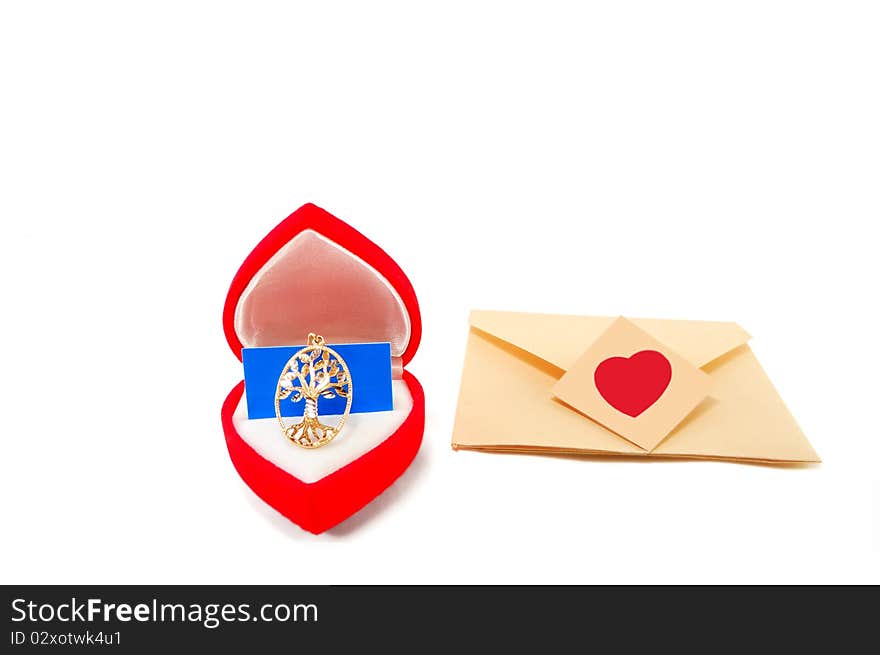 Gold female ornament with an envelope isolated on a white background