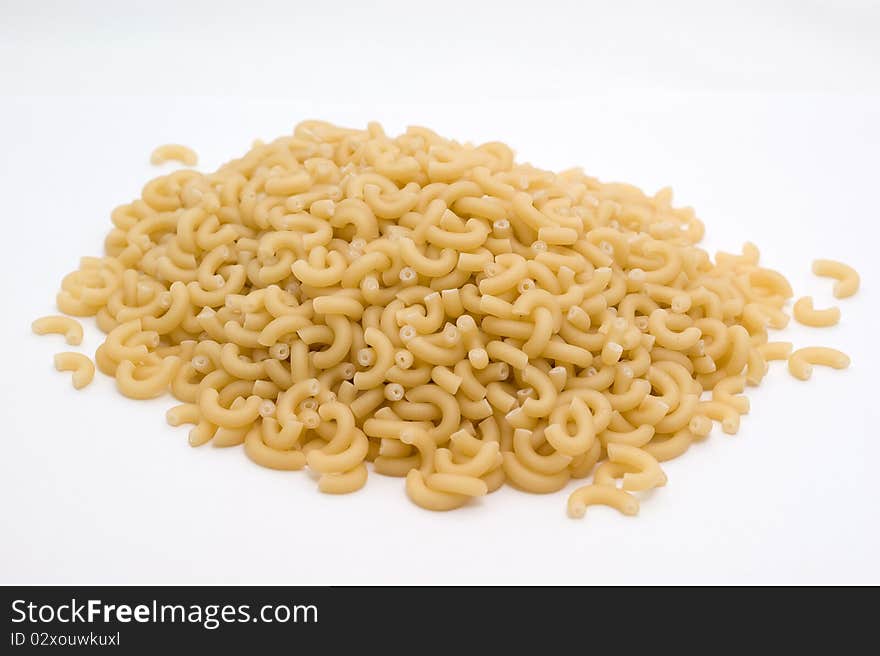 Noodless made fom wheat flour on a white background