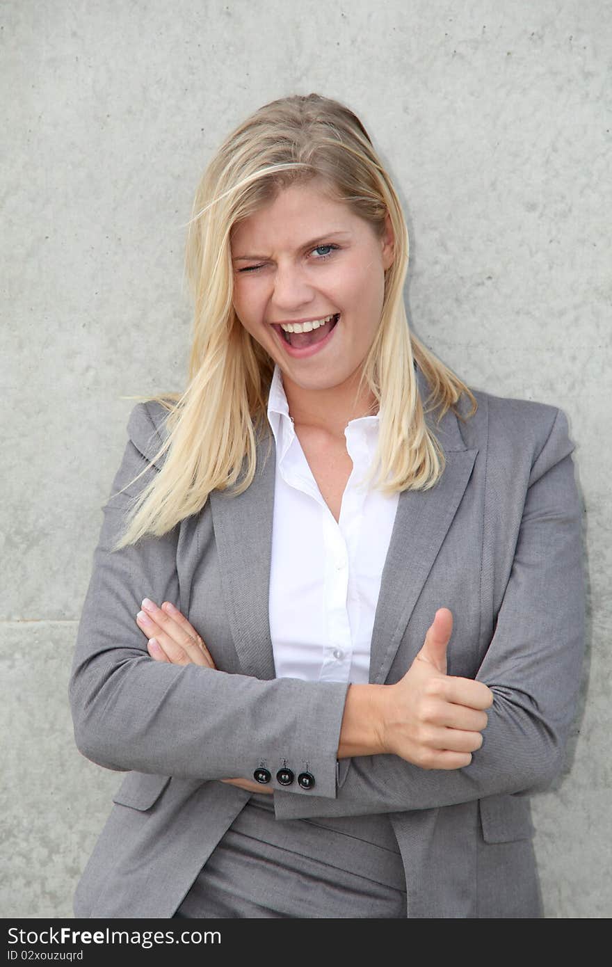 Businesswoman showing thumb up