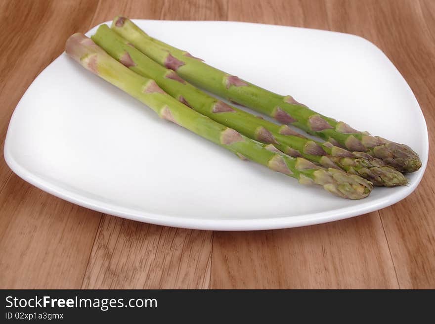 Fresh green Asparagus spears isolated over white