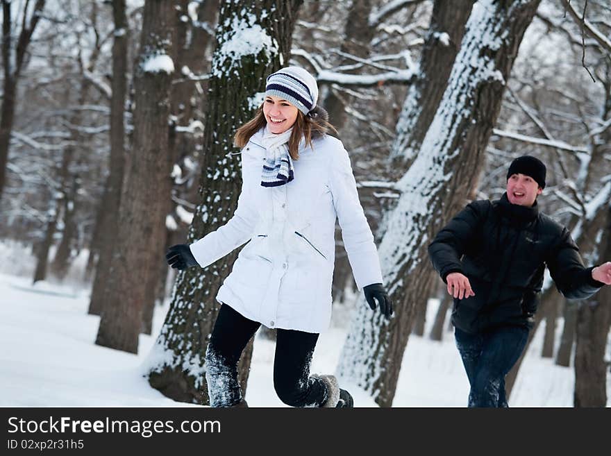 Young couple playing outdoors.