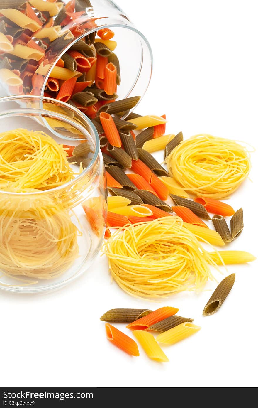 Pasta in glass jar on a white background