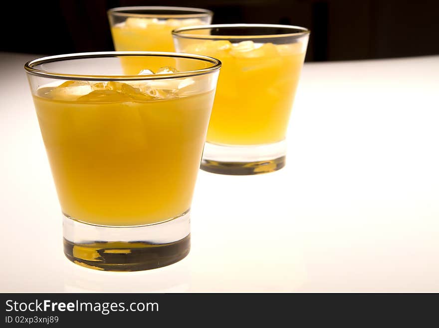 Glass of orange juice with ice