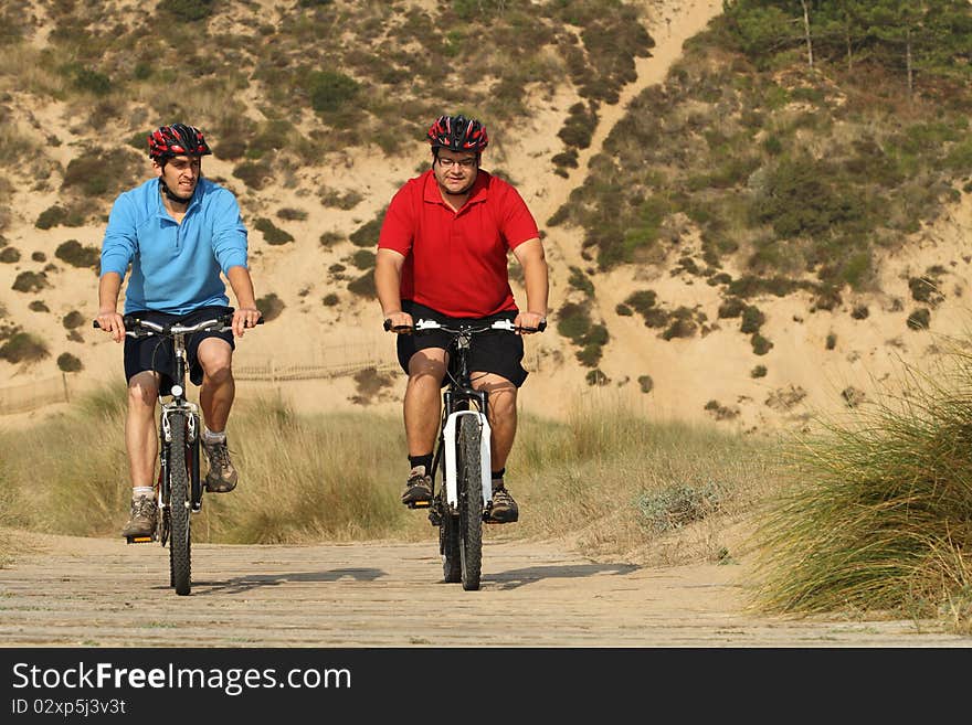 Biker´s in action with a beautiful landscape. Biker´s in action with a beautiful landscape