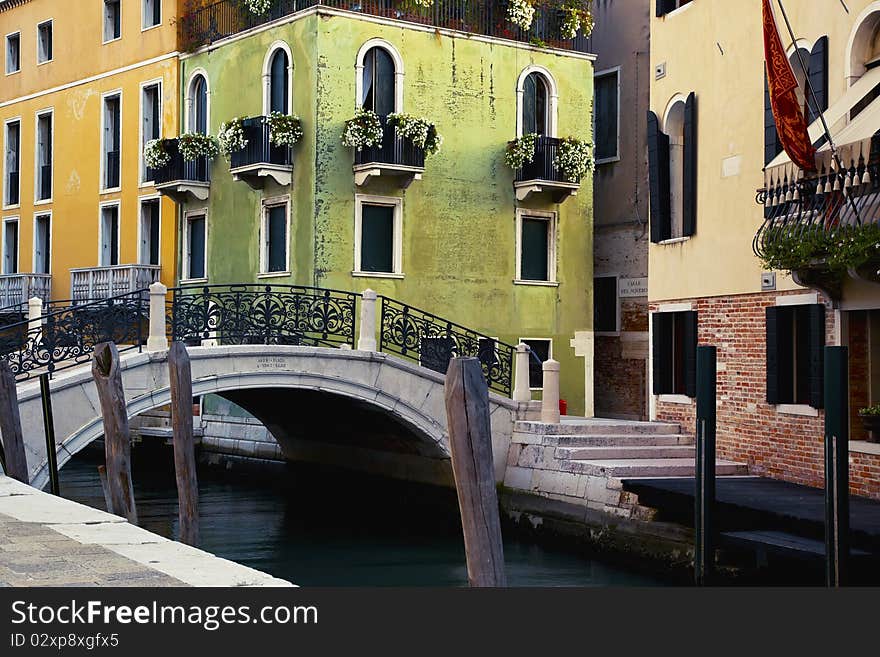 Green and yellow houses in Venice