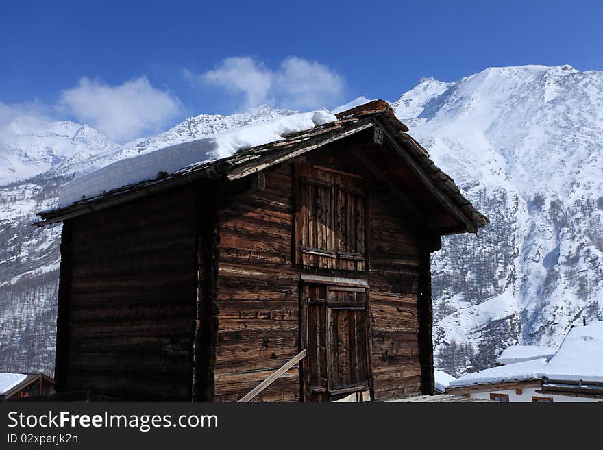 Chalet in the Saas-Fee village in the Swiss Alps.Its location close to the glaciers of the Dom and the Allalinhorn provides winter sport opportunities throughout the year, and neighbouring peaks such as the Weissmies, the Nadelhorn and the Lenzspitze are popular climbs in the summer season. The community is considered to be a very attractive winter sport destination in the Swiss Alps. Typical activities include skiing, carving, snowshoe trekking, canyon climbing and ice climbing. Chalet in the Saas-Fee village in the Swiss Alps.Its location close to the glaciers of the Dom and the Allalinhorn provides winter sport opportunities throughout the year, and neighbouring peaks such as the Weissmies, the Nadelhorn and the Lenzspitze are popular climbs in the summer season. The community is considered to be a very attractive winter sport destination in the Swiss Alps. Typical activities include skiing, carving, snowshoe trekking, canyon climbing and ice climbing.