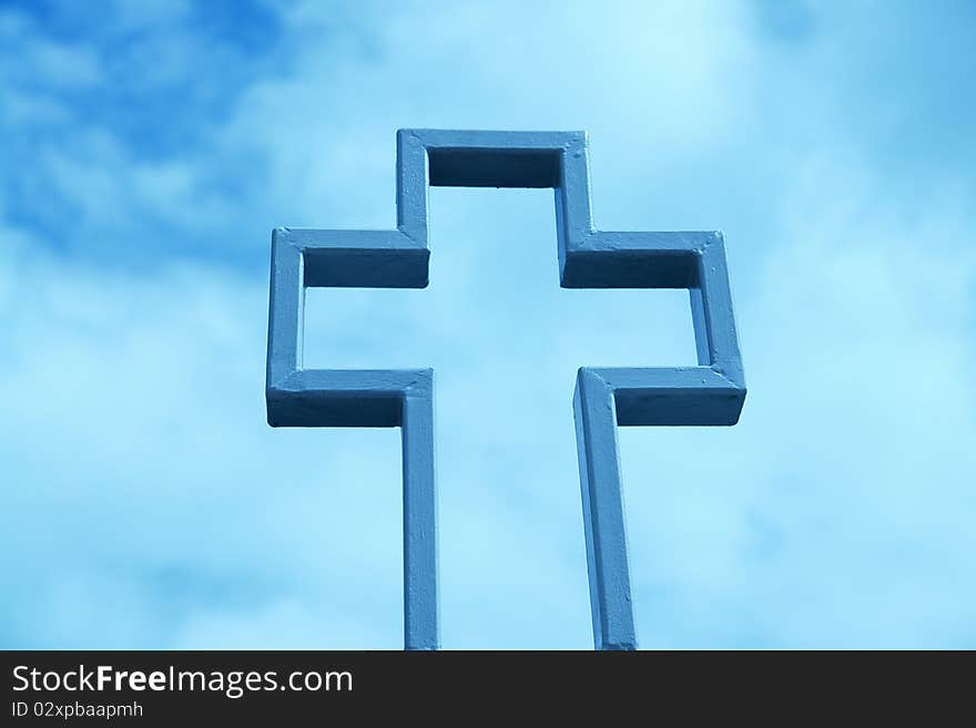 A catholic church cross in the sky background. A catholic church cross in the sky background