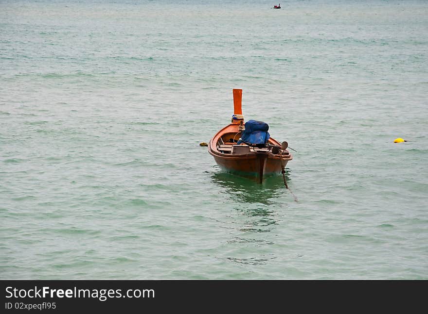 Boat is float on the sea alone.