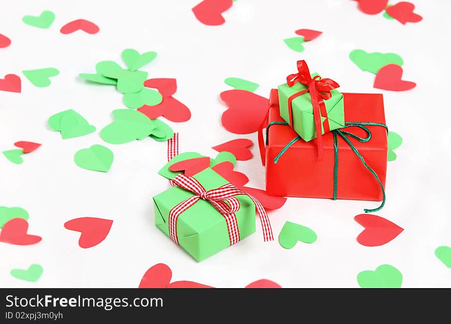 Hearts and presents on the white background