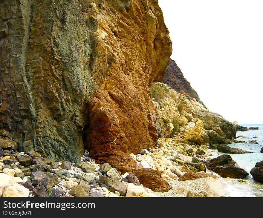 Mountain cliff above Sea coast. Mountain cliff above Sea coast