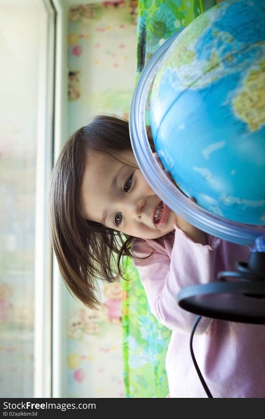 A little girl and the globe