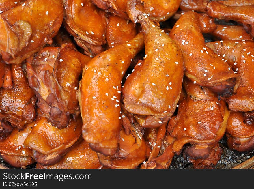 Fried drumsticks pile with sesame topping.