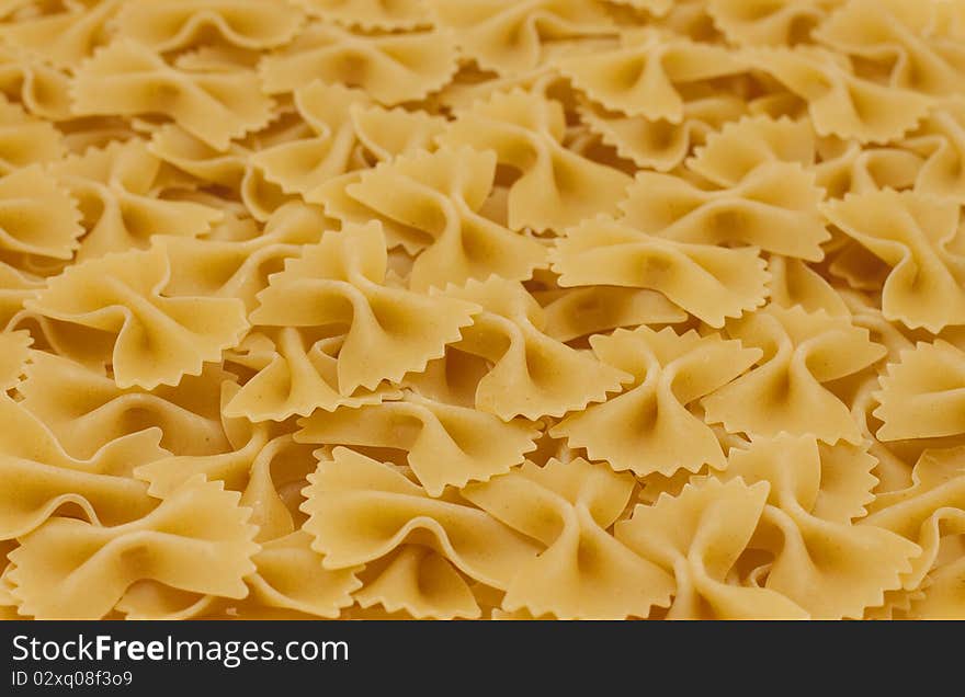 Many yellow macaroni like bow. Many yellow macaroni like bow