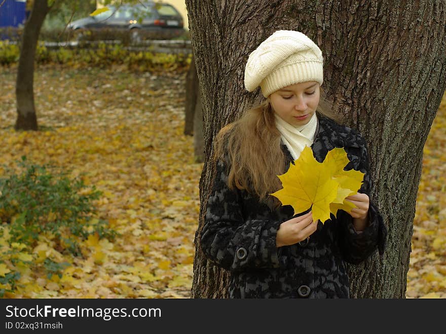 Female holding leaves