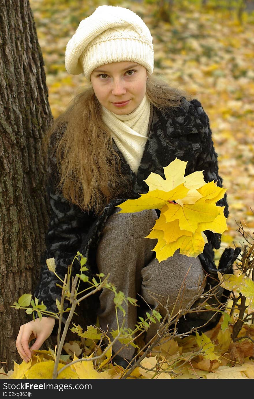 Girl holding leaves