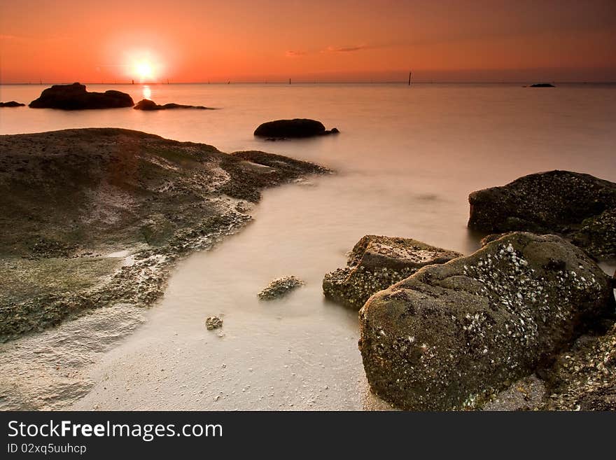 Sunset and soft sea in tropical zone