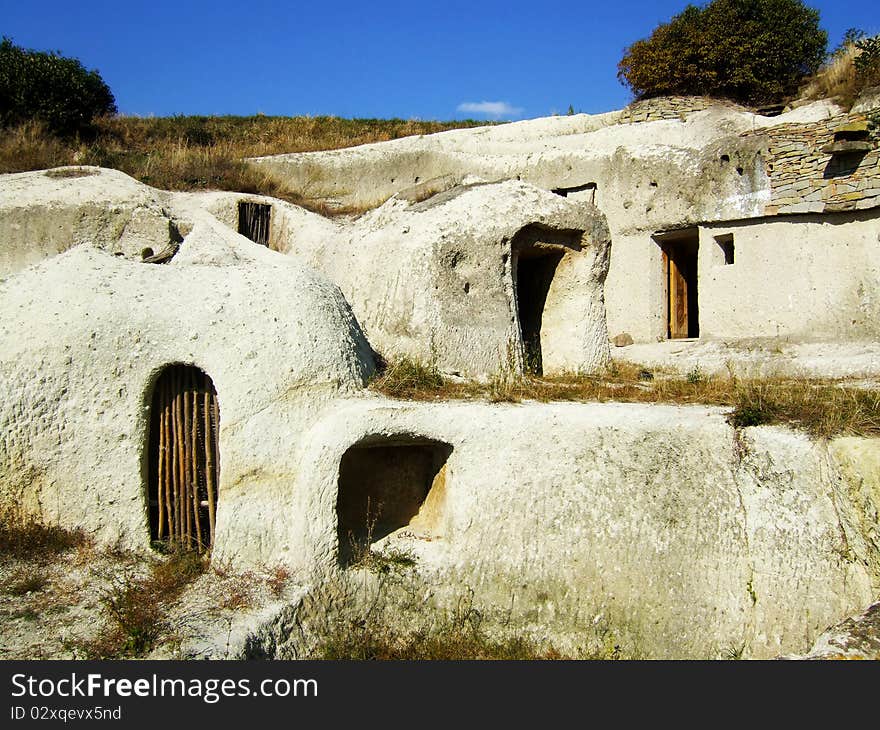 Image of house delved in soft stone. Image of house delved in soft stone