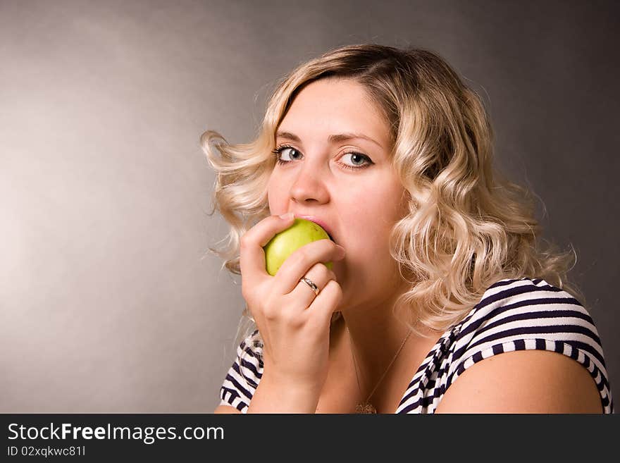 Photo of beautiful young woman of blonde with apples. Photo of beautiful young woman of blonde with apples.