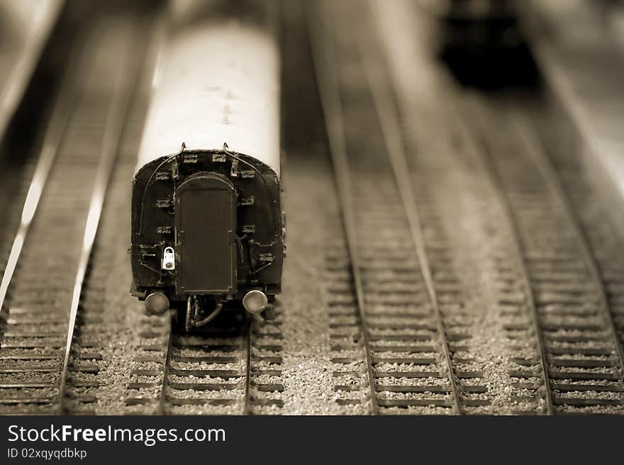 Miniature model train carriage macro with sepia tint. Miniature model train carriage macro with sepia tint