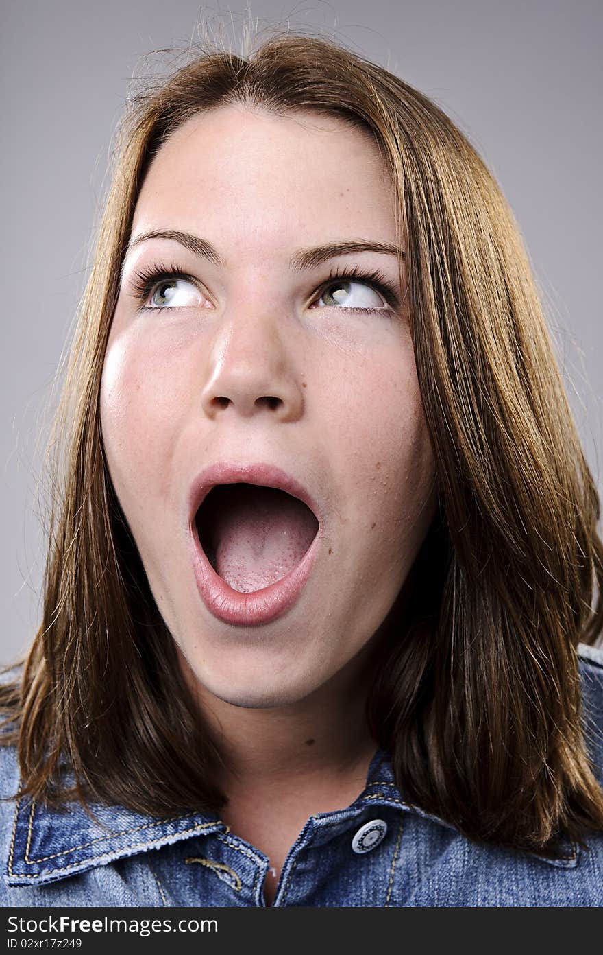 Screaming and shouting young girl portrait. Screaming and shouting young girl portrait