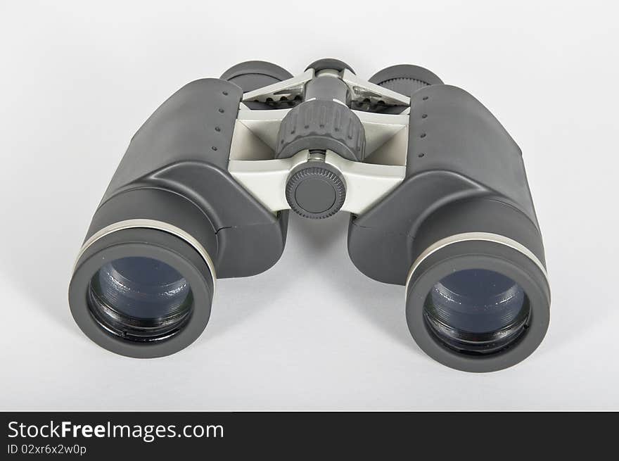 A pair of black rubber binoculars metaphor vision and ability to advance