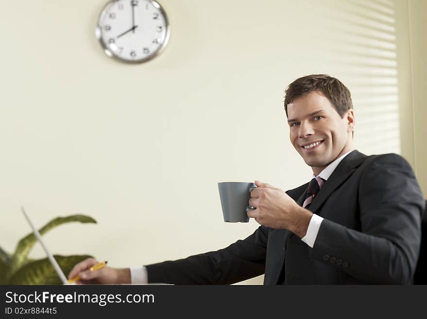 Businessman Working On Laptop