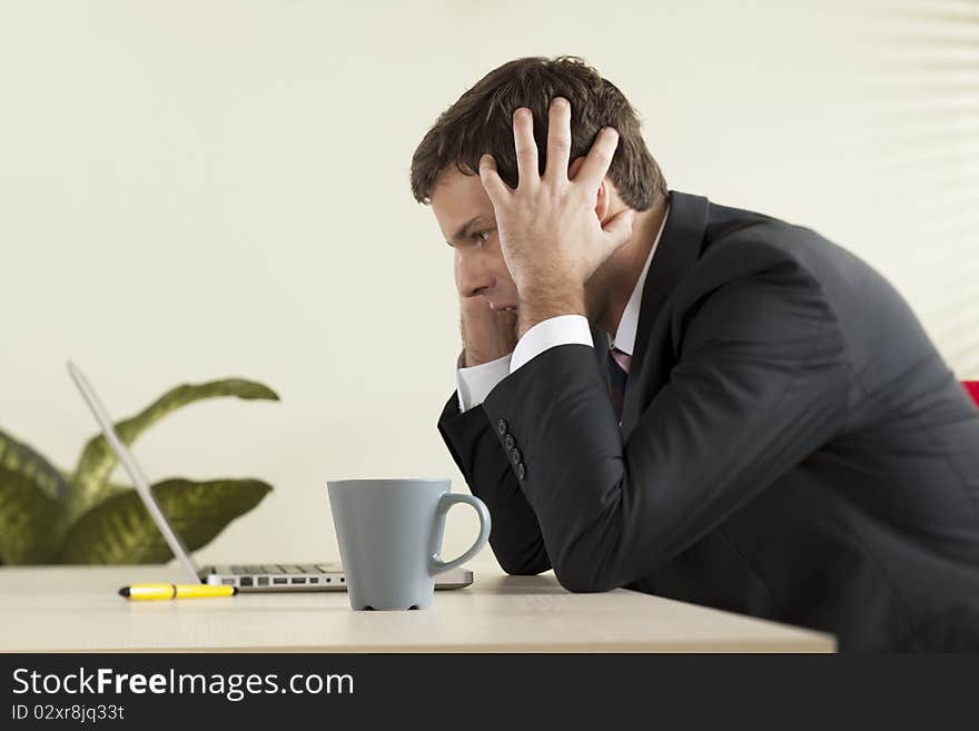 Businessman Working On Laptop