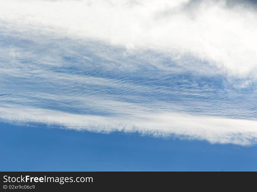 Clouds against the blue sky. Clouds against the blue sky