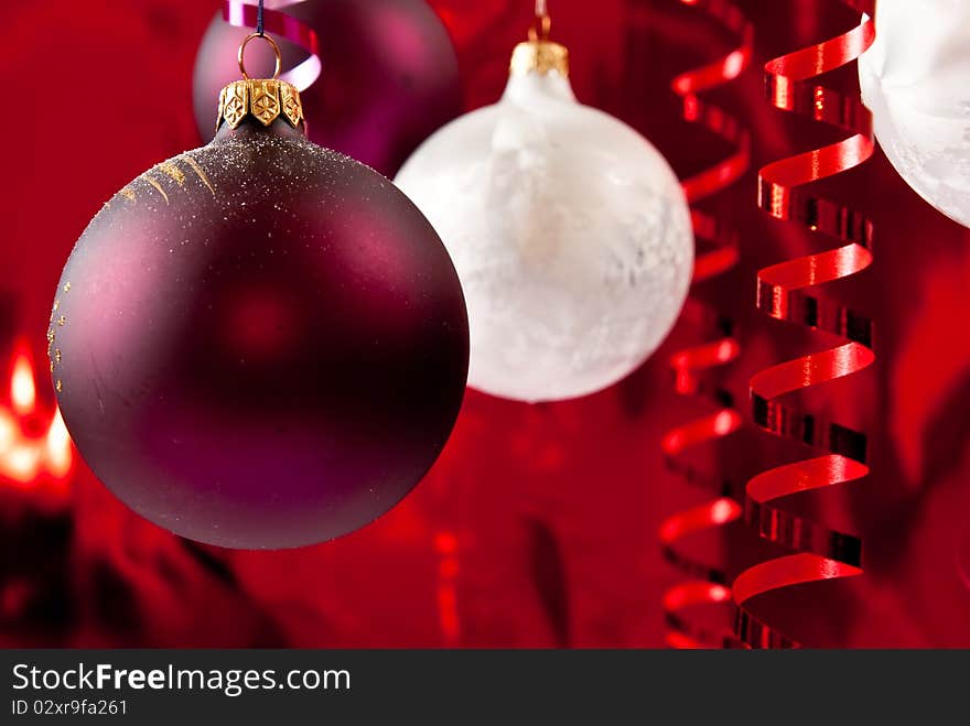 Christmas baubles and ribbons on red background. Christmas baubles and ribbons on red background