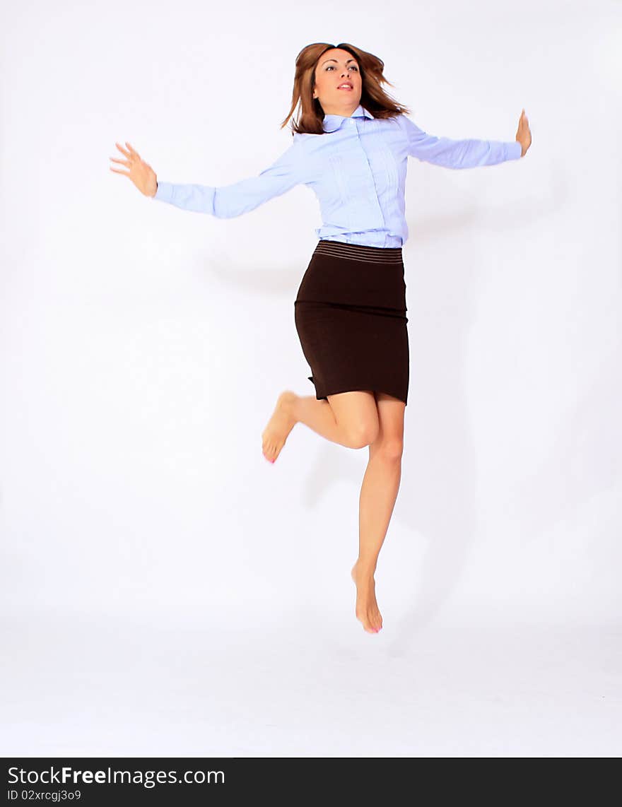 Attractive woman is jumping in the air. Attractive woman is jumping in the air