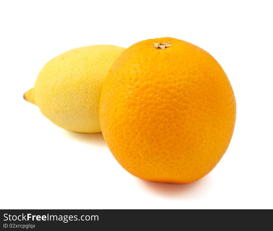 Orange and lemon on a white background