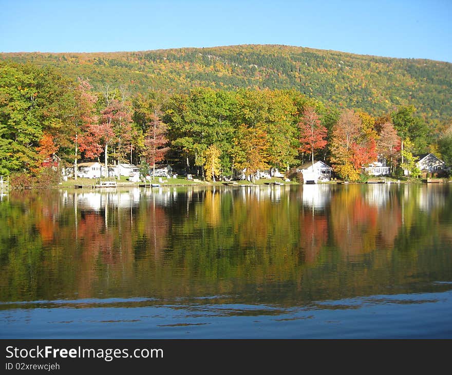 Beautiful reflections of the fall foliage is a perfect mirror image on a fall afternoon at Lake Dunmore. Beautiful reflections of the fall foliage is a perfect mirror image on a fall afternoon at Lake Dunmore.