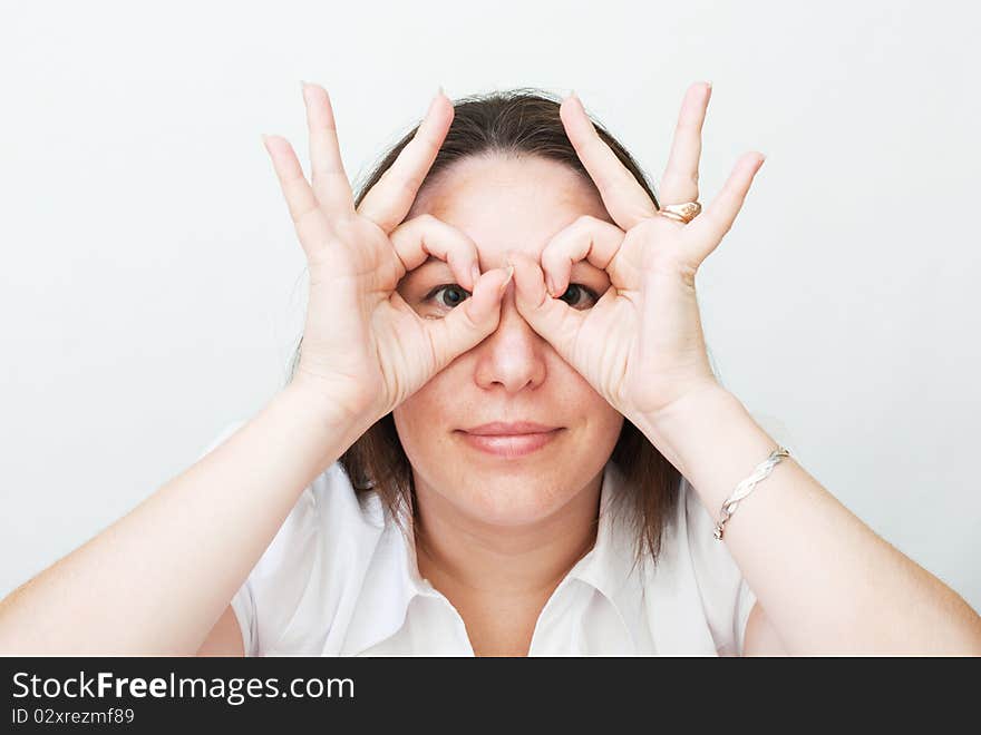 Portrait of the beautiful woman on gray background