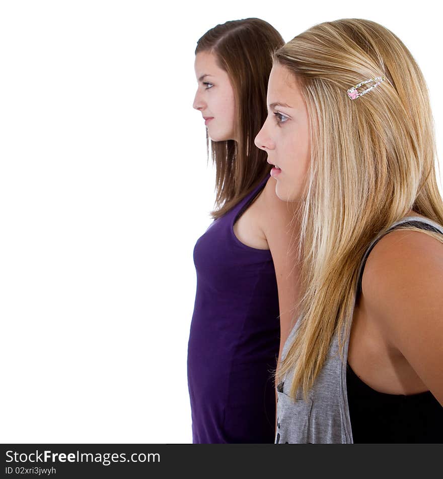 Young stylish teenagers chatting - isolated over white background. Young stylish teenagers chatting - isolated over white background.