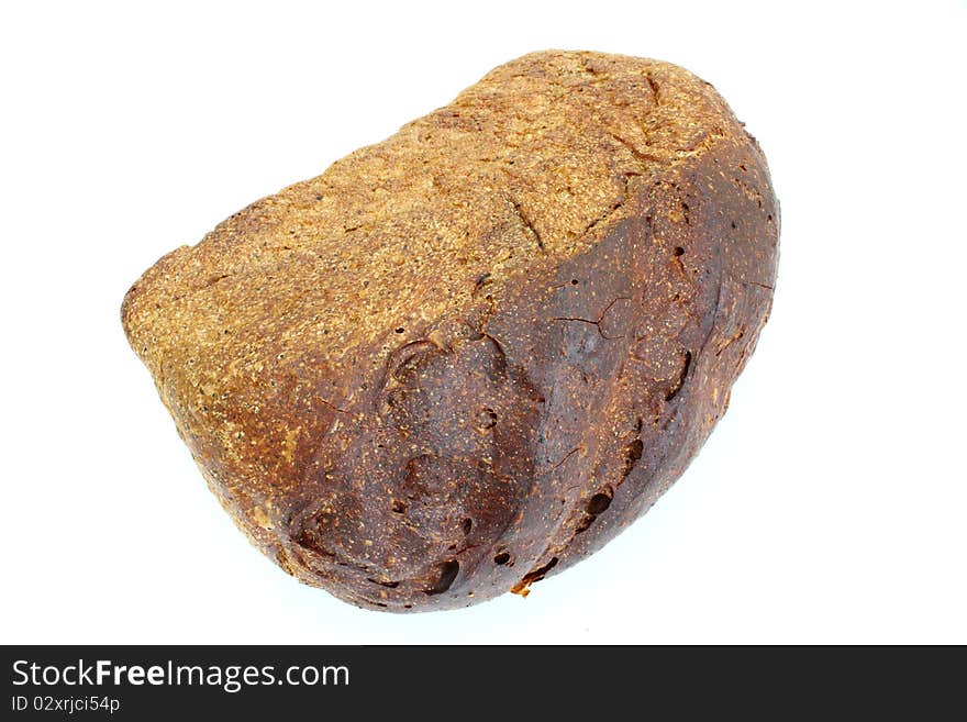 Black rye bread with the fried crust is isolated on a white background