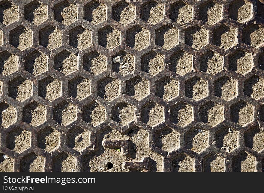 Metal texture in the form of honeycomb. Close-up, front.