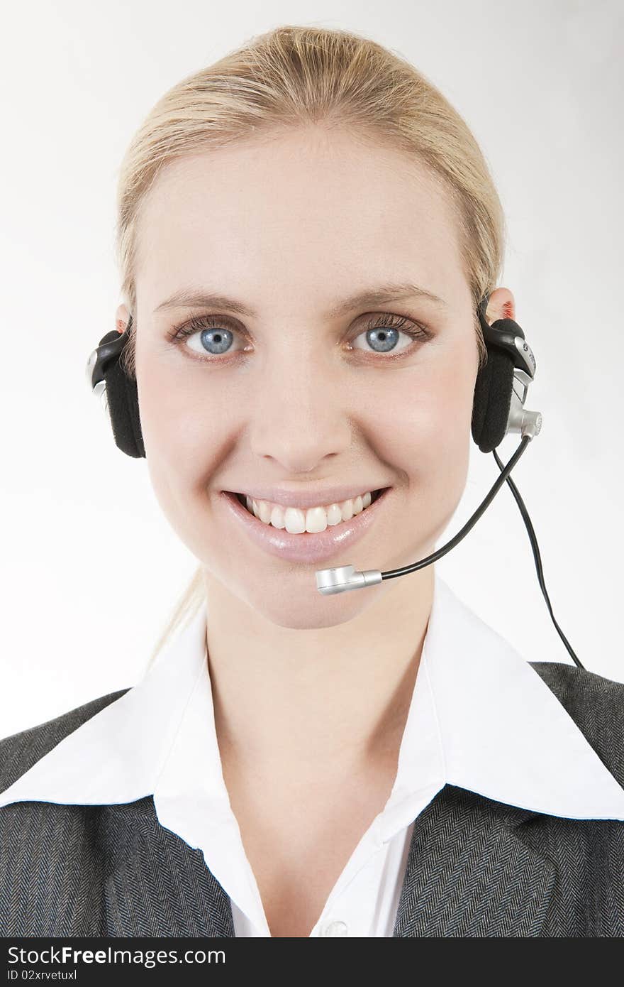 Business woman talking on headphones