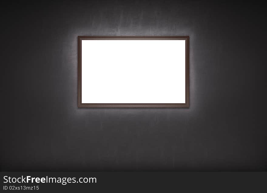 Empty picture illumination on the dark wall