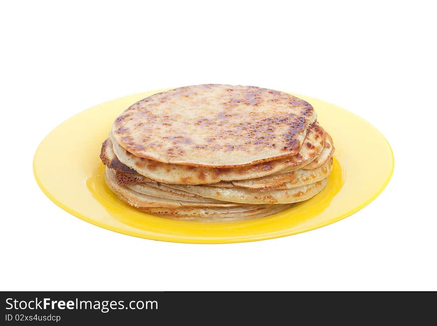 Pancakes on plate, isolated on white