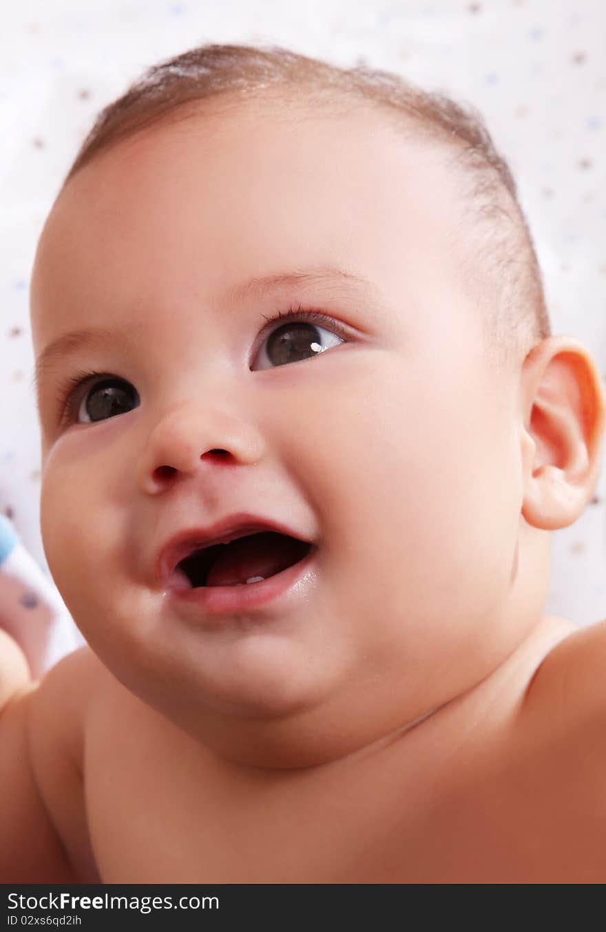 Baby smiling over white background, beauty image. Baby smiling over white background, beauty image