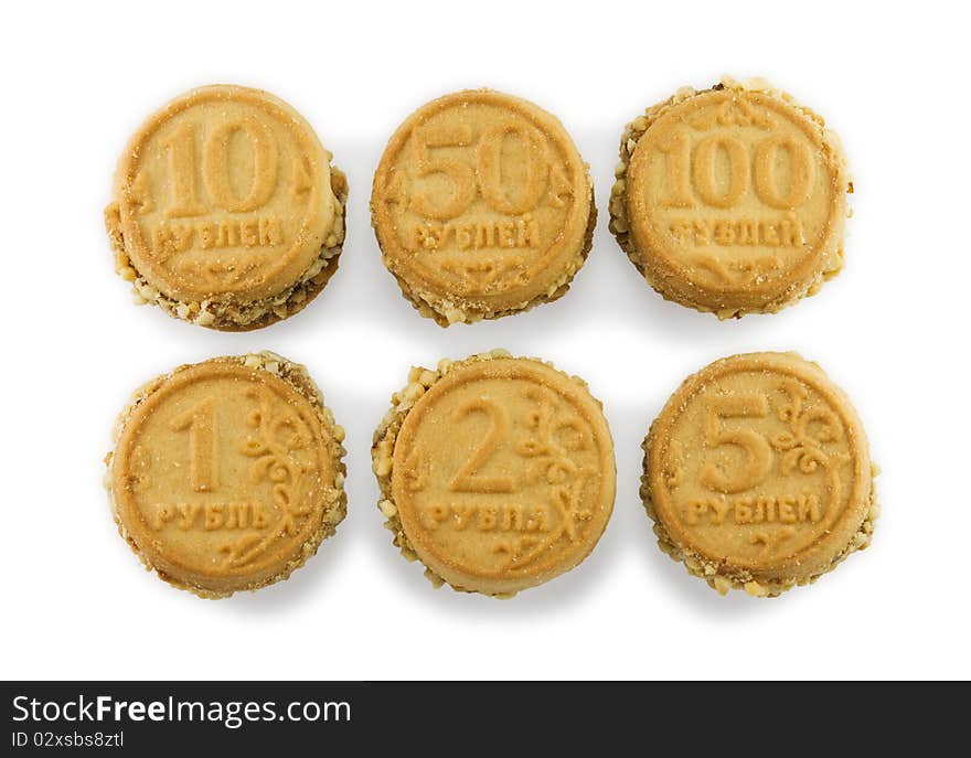 Cookies in the shape of coins. On white background.