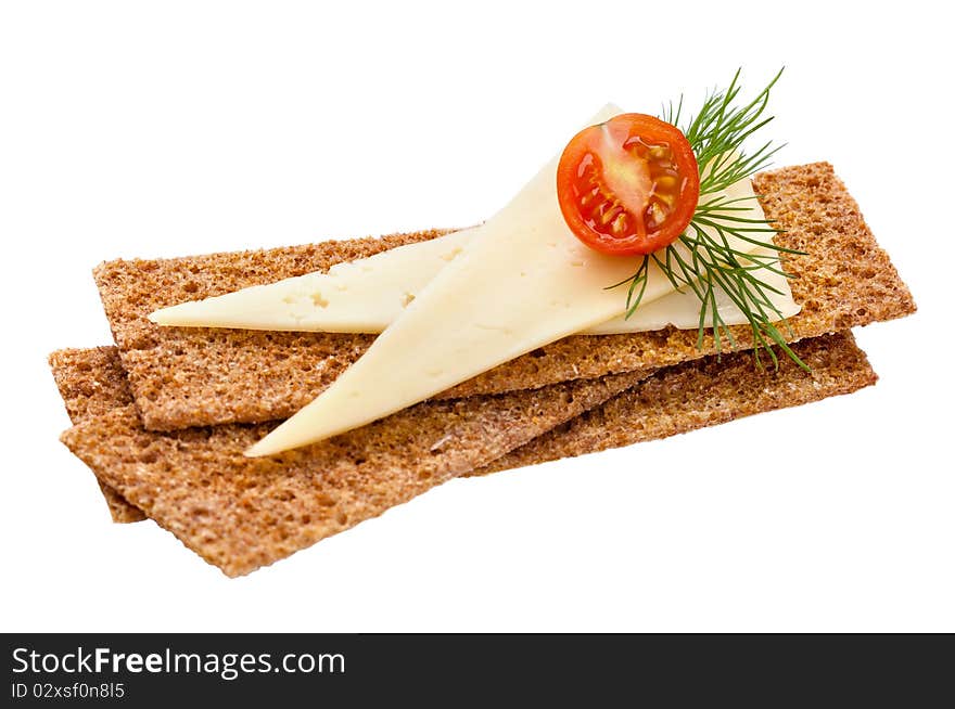 Crispbread with cheese, tomato and dill isolated on white. Healthy breakfast.