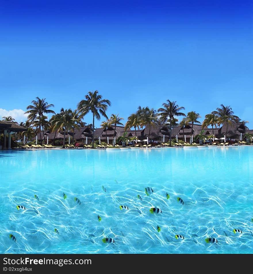 Tropical Beach with Bungalows and blue sky