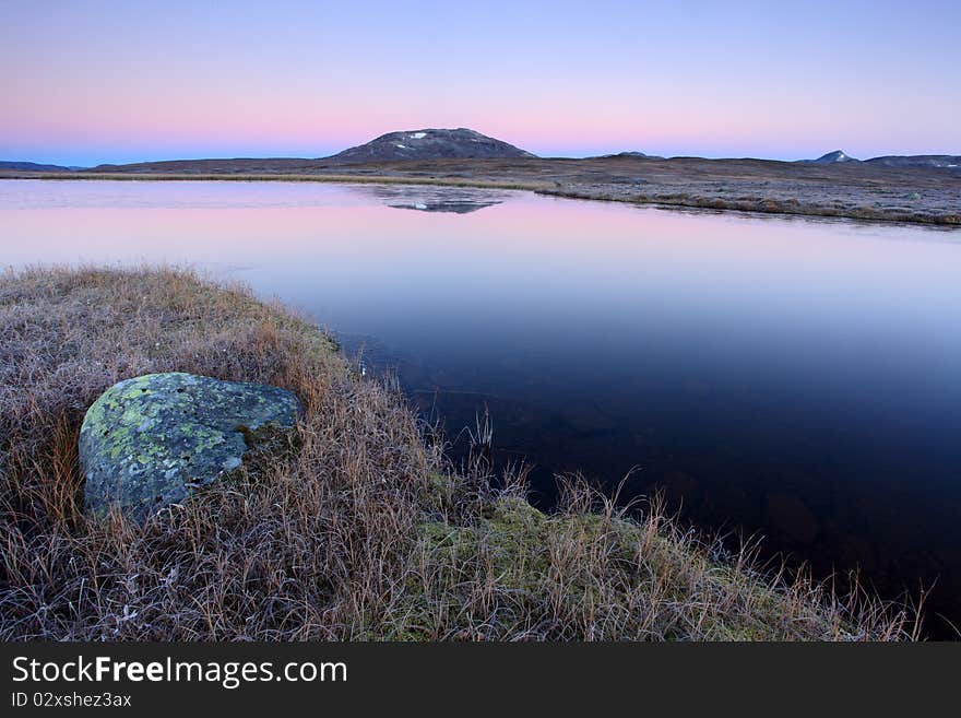 Mountain lake in early morning light