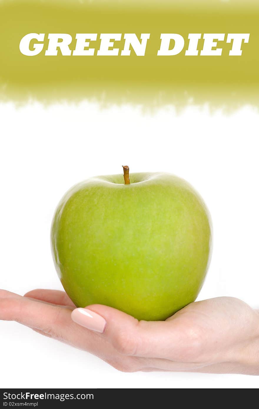 Green apple in a beautiful hand of woman